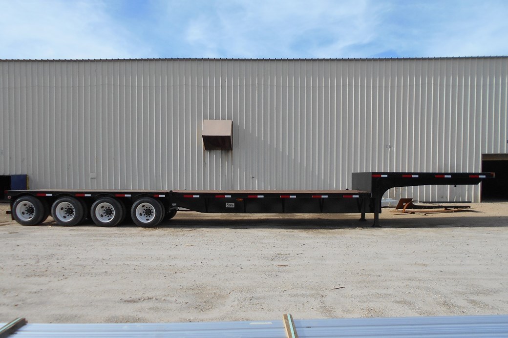 The bed is 40' long and fits one 40' ISO container